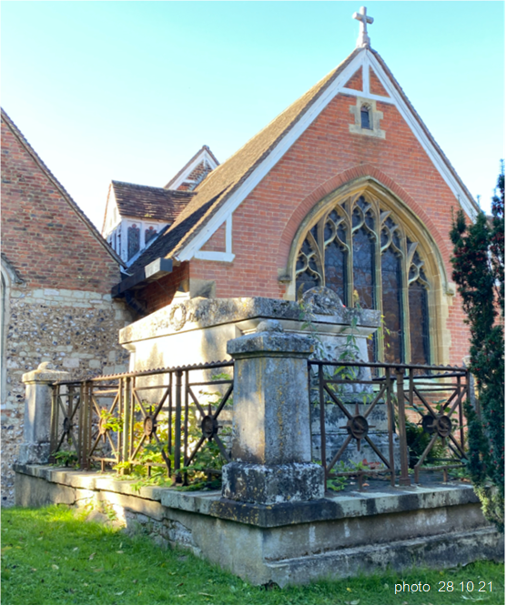 A fountain in front of a brick buildingDescription automatically generated with medium confidence