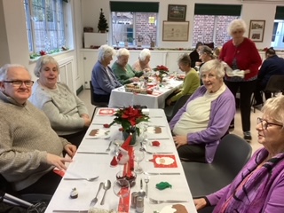 Guests enjoying a meal with the Sunday Lunch Club